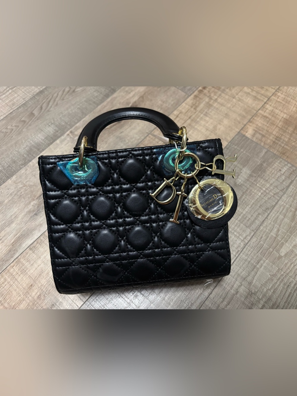 Black Quilted Mini Top-Handle Bag with Gold Accents